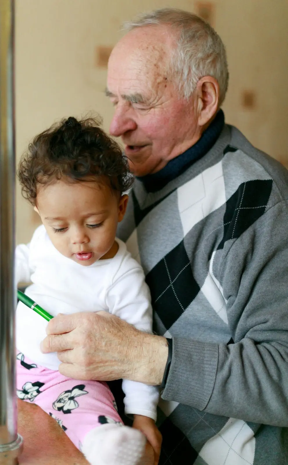 Older adult in Arizona smiling during a Total Life video therapy session
